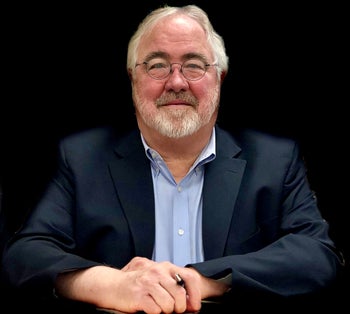 Portrait of Tom McAuliffe, Associate Broker, ABR, CRB, GRI, CRS